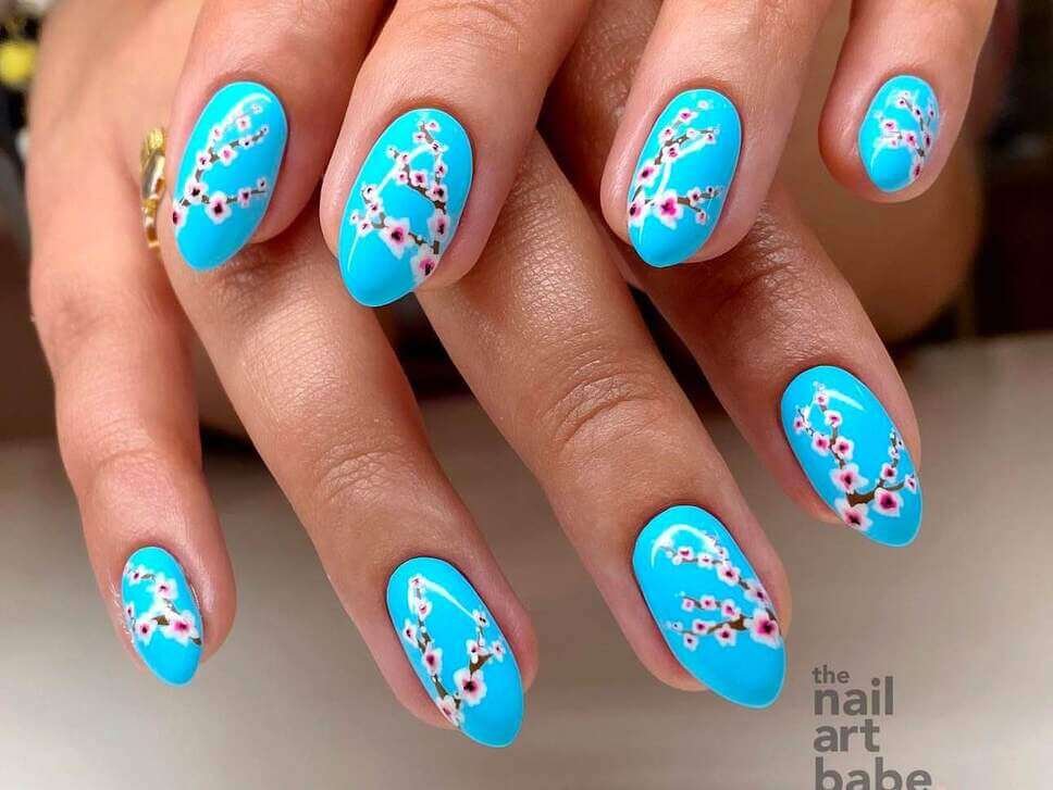 blue cherry blossom nails