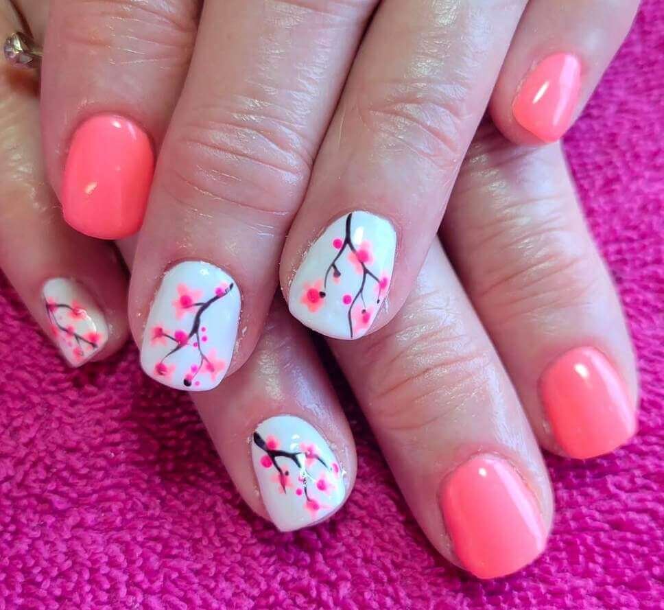 neon pink cherry blossom nails