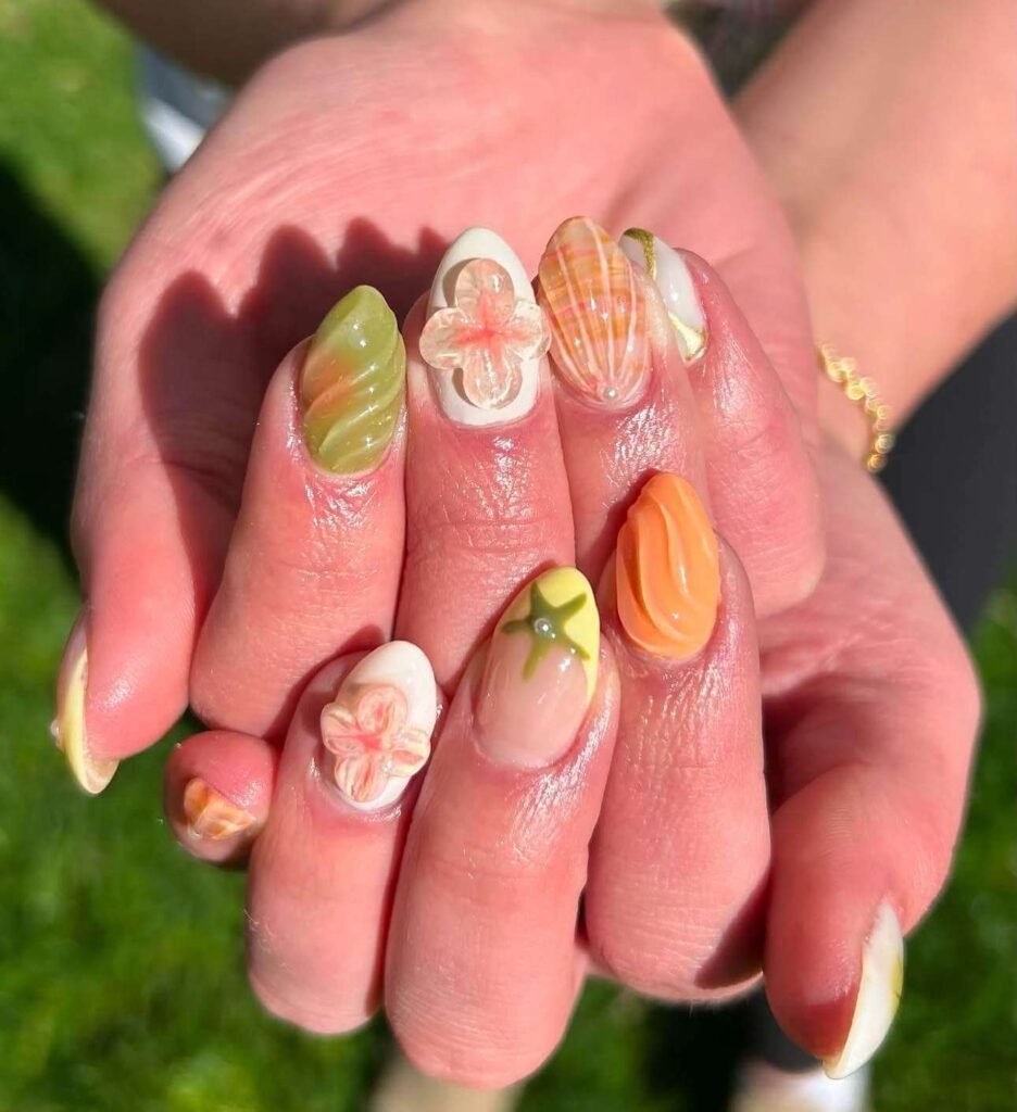 orange seashell nails