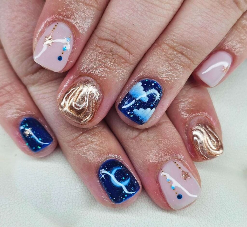 blue cloud nail designs with gold