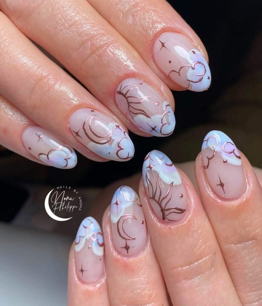 white and gold cloud nails