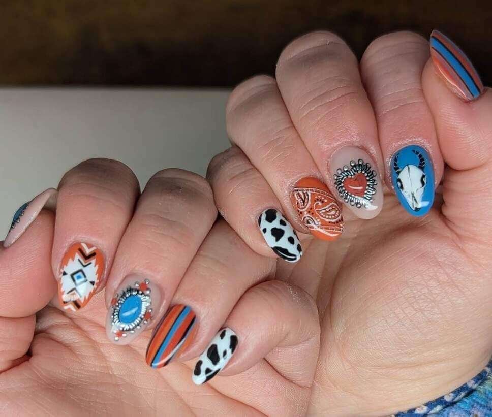 turquiose cowgirl nail designs