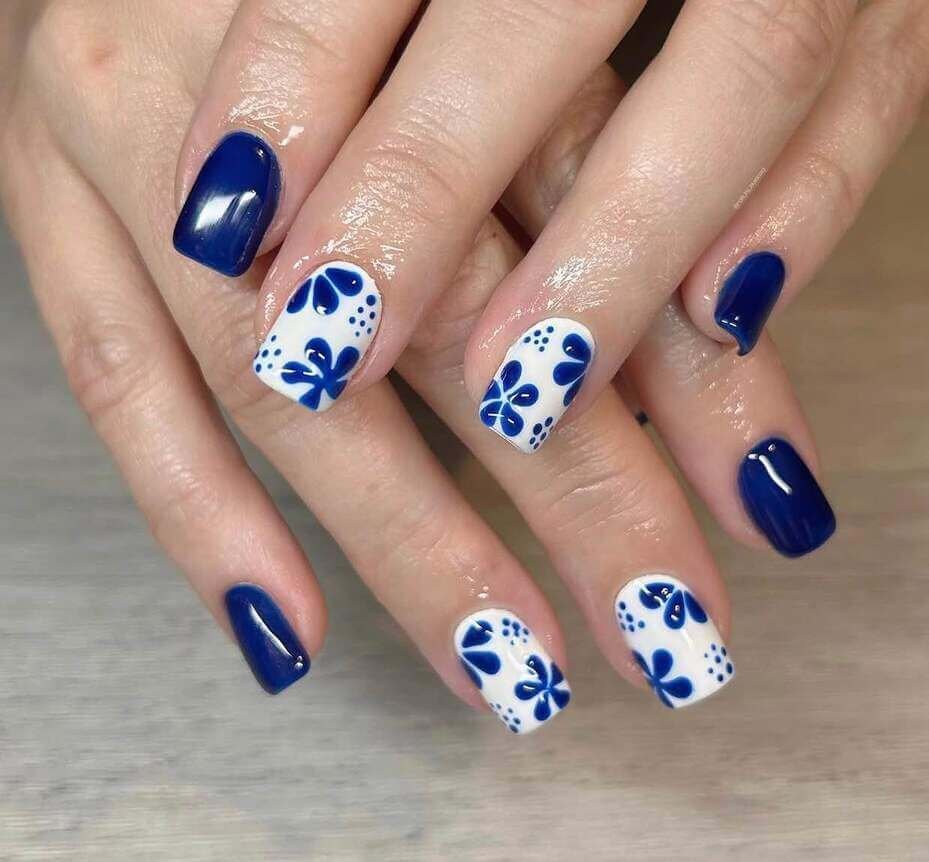 blue and white floral nails