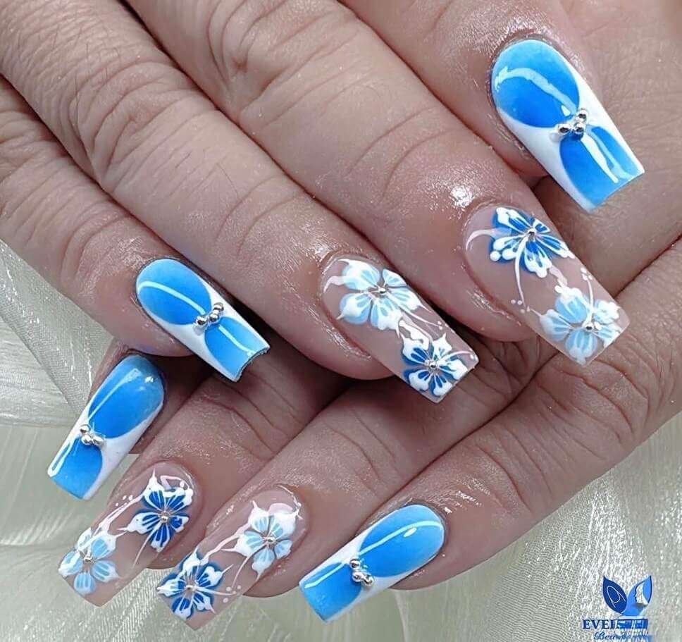 blue and white floral nails