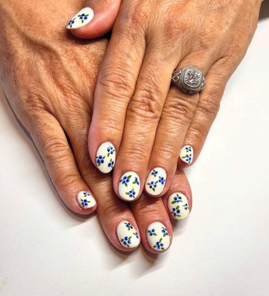 short blue and white floral nails